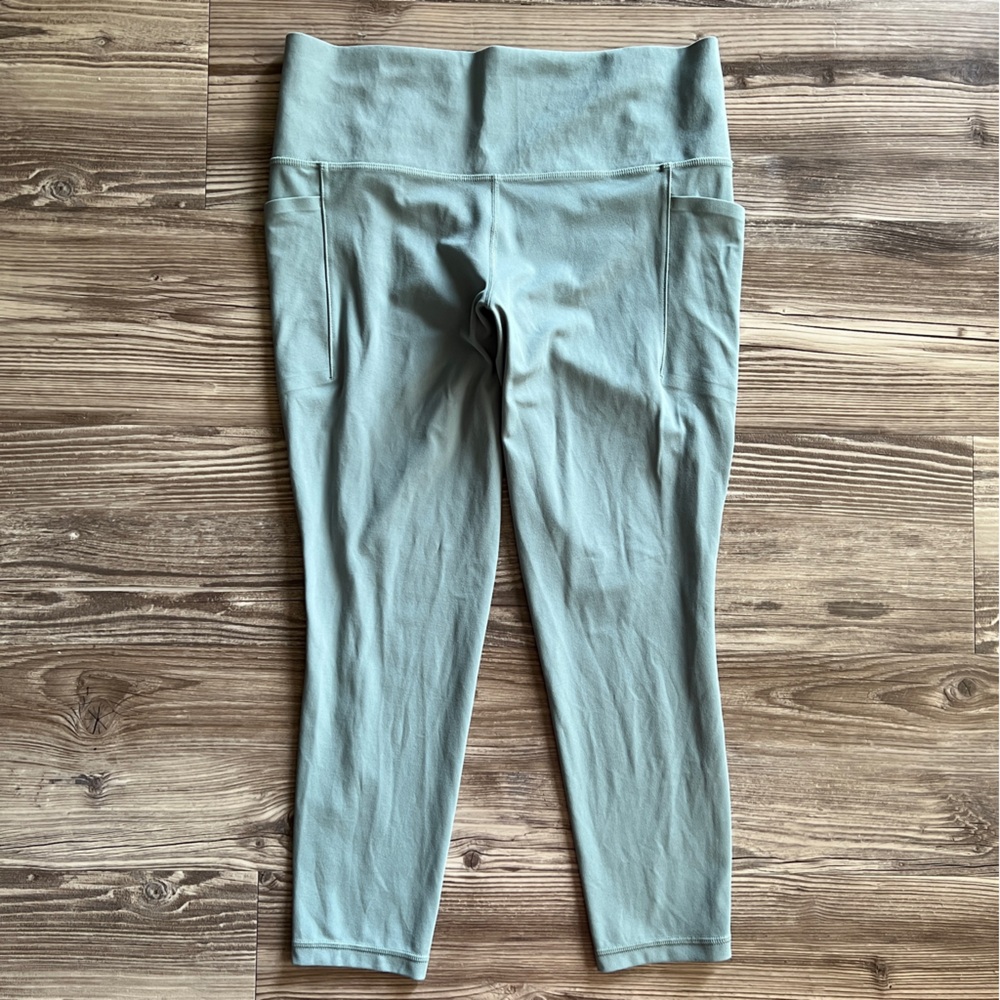 Athleta Salutation Stash Pocket II 7/8 Tight in Powervita Slate Blue Leggings